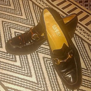 Women's size 10.5 B Gucci patent leather loafers.